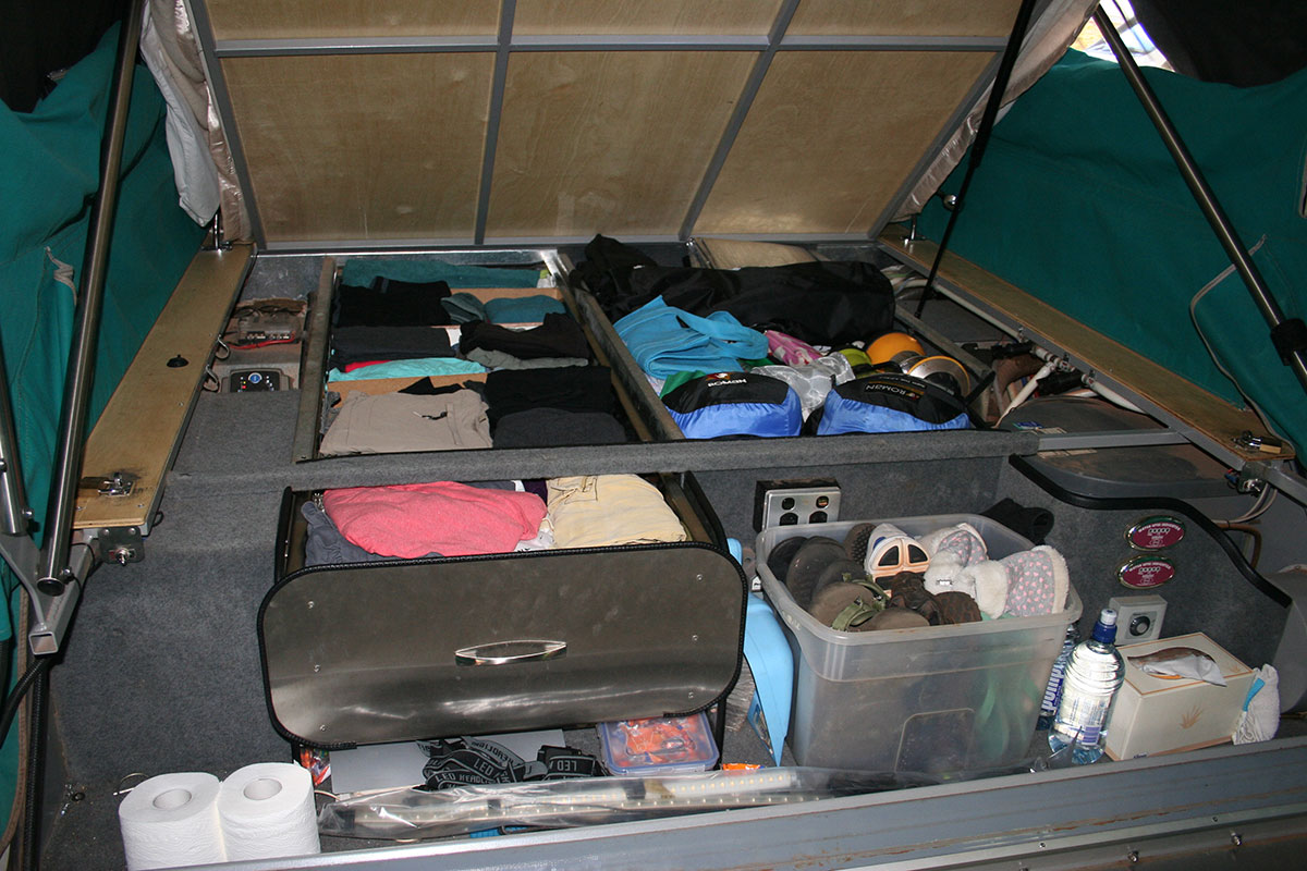 Clothes all packed up in a caravan