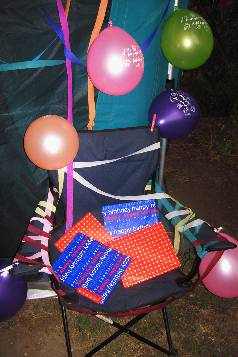 birthday celebrations on a camping chair